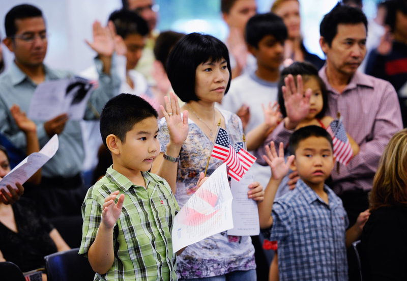Children And Adults Are Sworn In As US Citizens During Ceremony