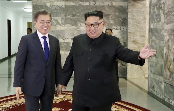 南韓總統文在寅與北韓領導人金正恩。 圖片來源：聯合新聞網