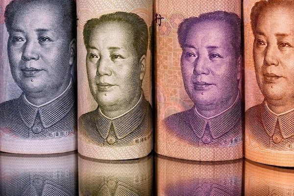 中國洗人民腦，還要奪人民幣。 圖片來源：聯合報